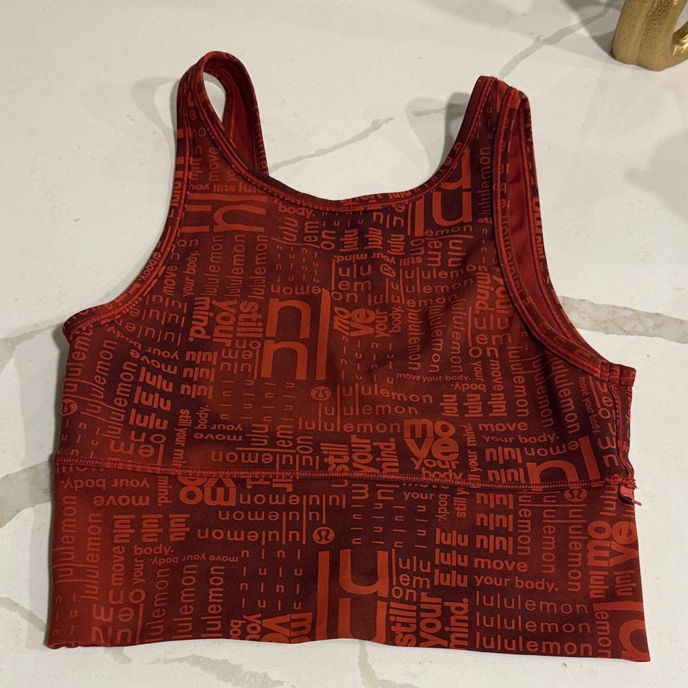 lululemon coral red workout top with logo print